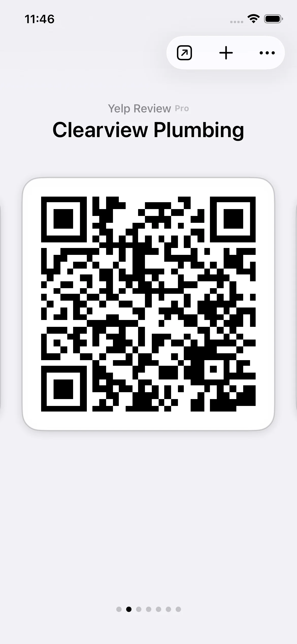 Screenshot of the QR Pad iPhone app showing a Yelp Review QR code for a business, ready to share with a customer.